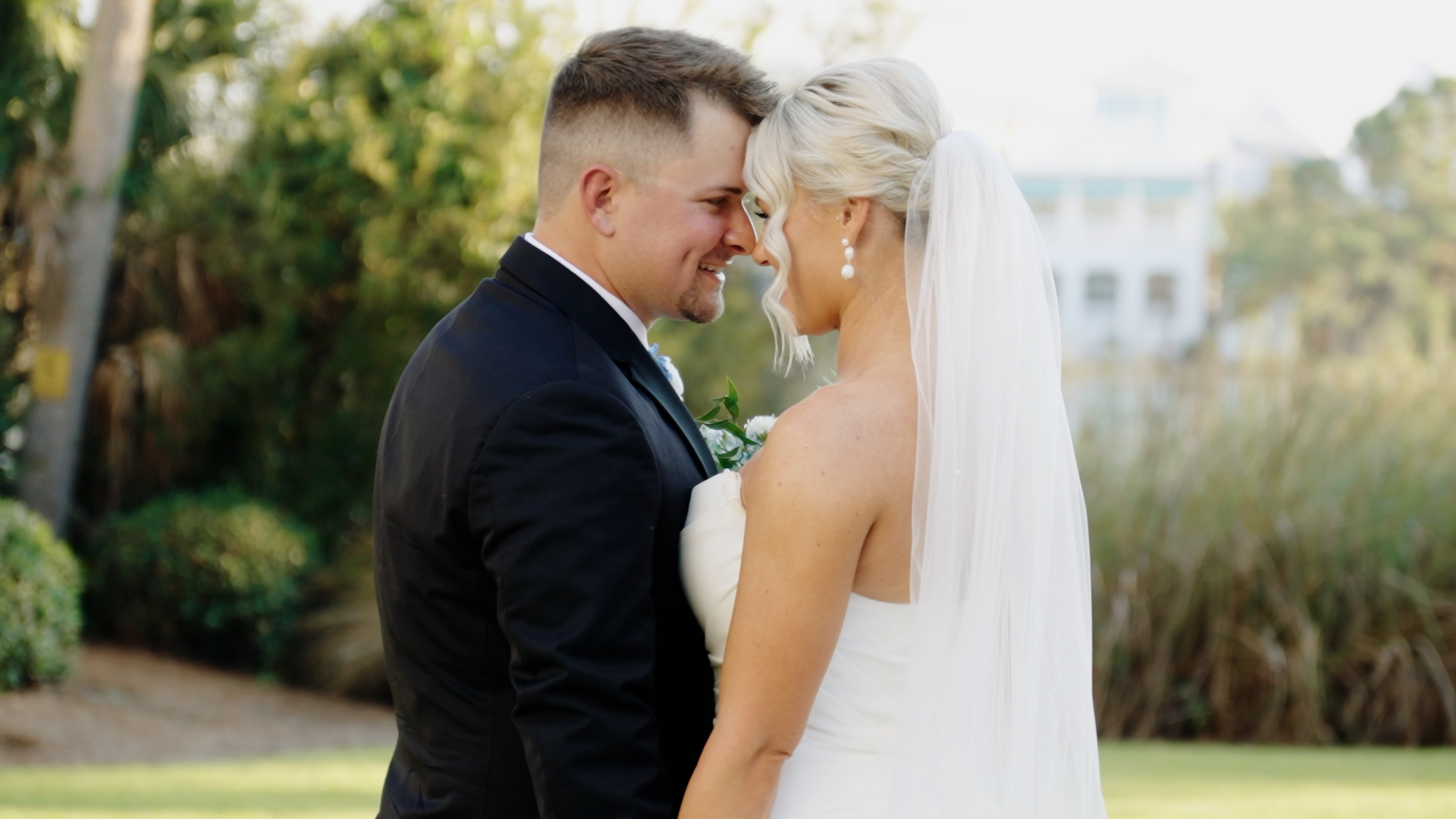 Bride and groom, Hannah and Shane, sharing a romantic moment on their wedding day in Florida.